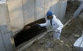 Professional waterproofing the exterior walls of the basement in Orlando, FL