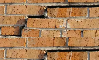Brick wall with serious structural damage in Orlando, FL